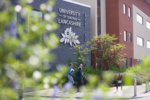 People walking past UCLan building