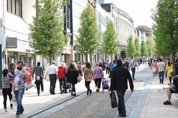 People walking along Fishergate High Street