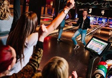 Group celebrating a bowling throw