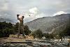 Tim Hetherington photography - man swinging golf club
