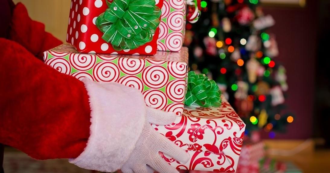 Santa holding presents close up Santa holding presents close up