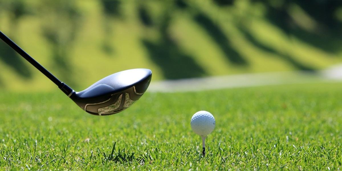 Golf club and ball close up
