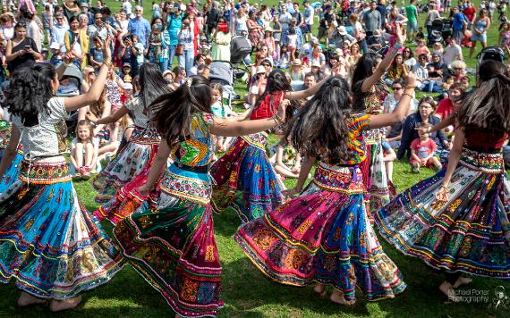 Indian dance performance taking place in front of crowds at Preston's annual Egg Rolling event.