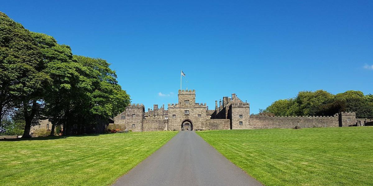 Main image: Hoghton Tower exterior. Long pathway, with grass on either side, leading to entrance to Hoghton Tower, Preston.