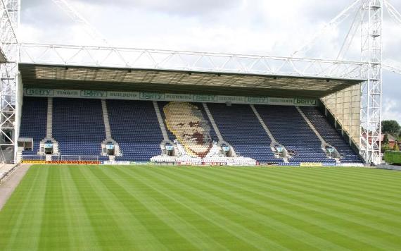 Deepdale Stadium football pitch and seating.