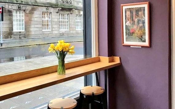 The Larder window seating looking out onto Lancaster Road.