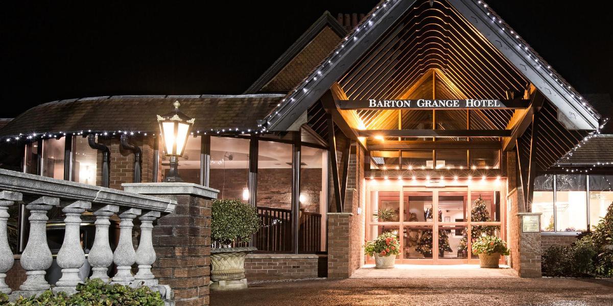 Barton Manor Hotel front entrance, lit up at night. Front entrance to Barton Manor Hotel, lit up at night.