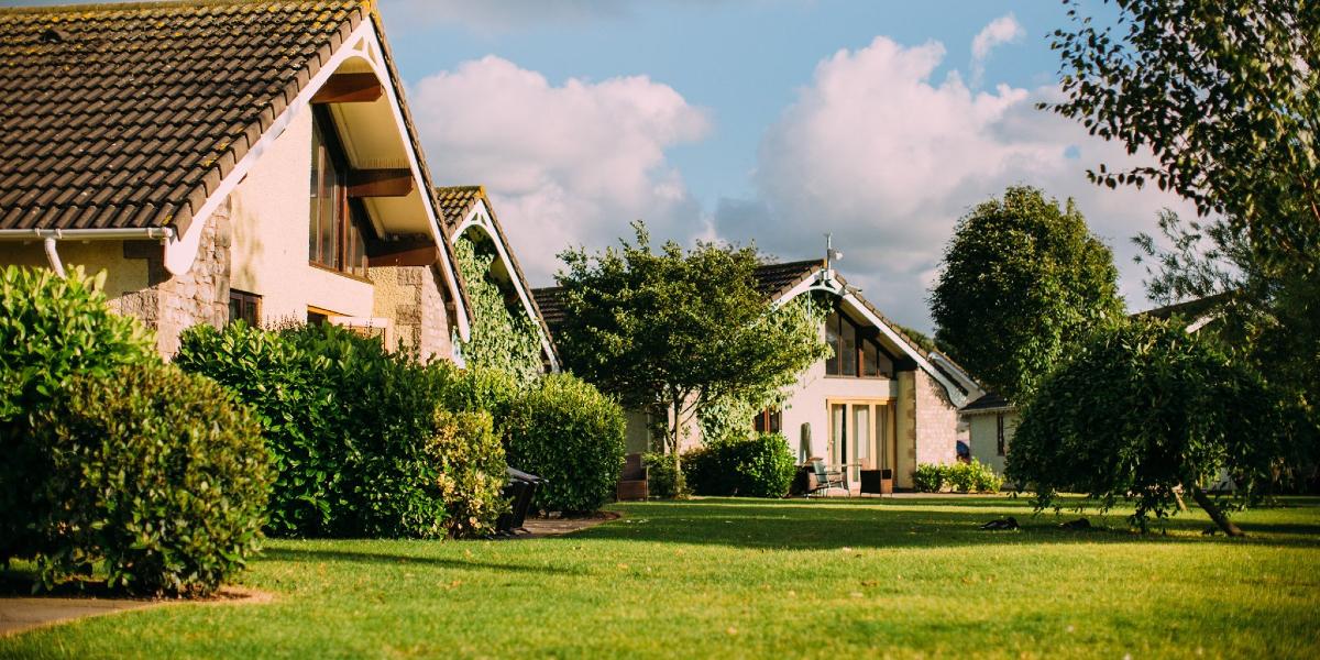 Main image: Lawn and holiday cottages in Ribby Hall Village. Lawn and holiday cottages in Ribby Hall Village.