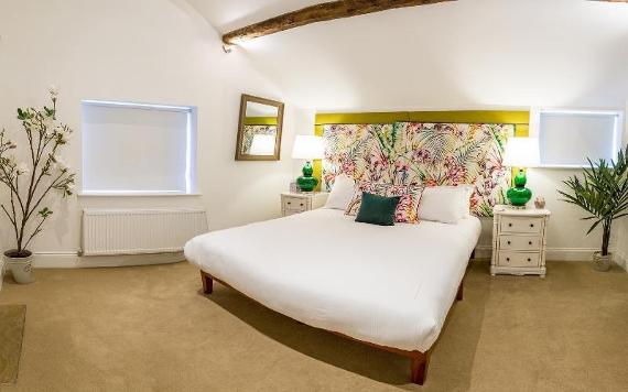 Winckley Square Hotel room decorated with tropical patterns and colours.