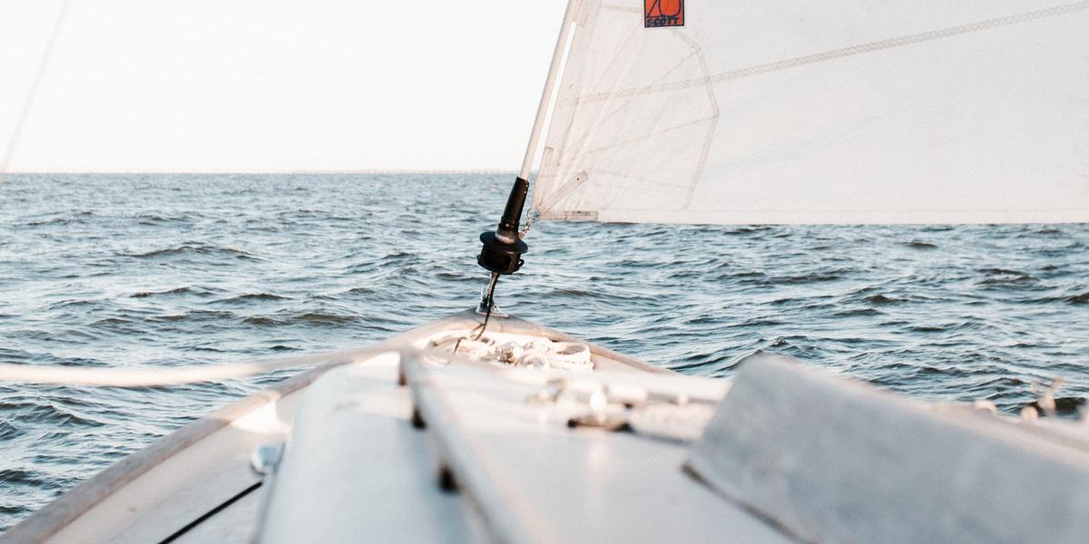 Main image Preston Keelboat Club View of sea from tip of sailboat.