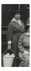 Beatrice Blackhurst stood on Preston Train Station platform holding bucket.